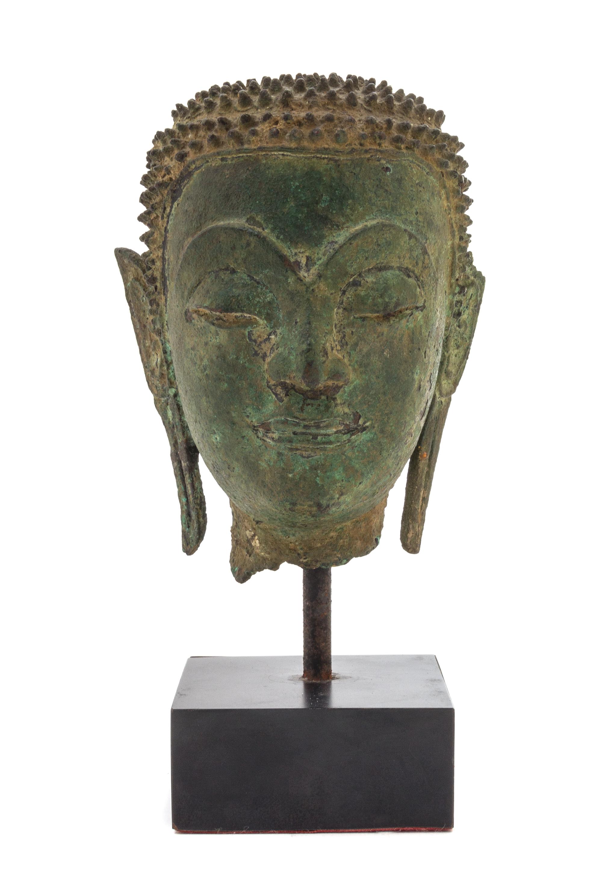A Thai Bronze Head of Buddha Height 4 3/8 inches. — AYUTTHAYA PERIOD, 16TH/17TH CENTURY