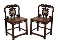 A Pair of Chinese Carved Hardwood Side Chairs with Marble Inset Back Panel