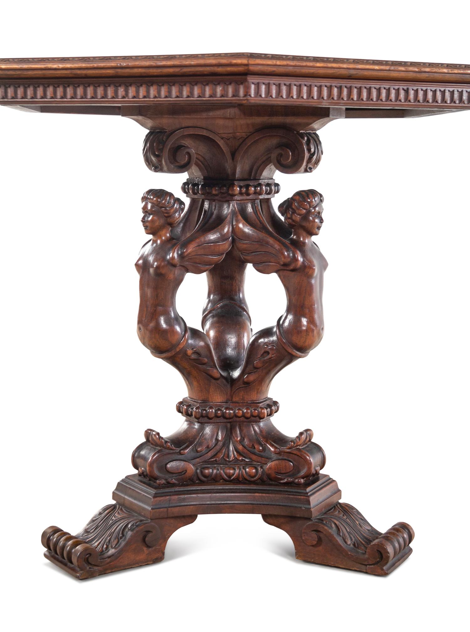 An Italian Renaissance Revival Carved Walnut Figural Table