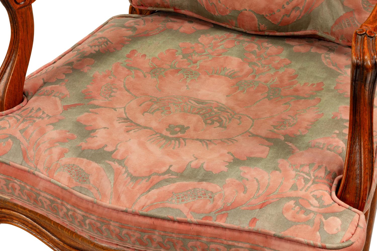 A Pair of Louis XV Style Oak Fauteuils