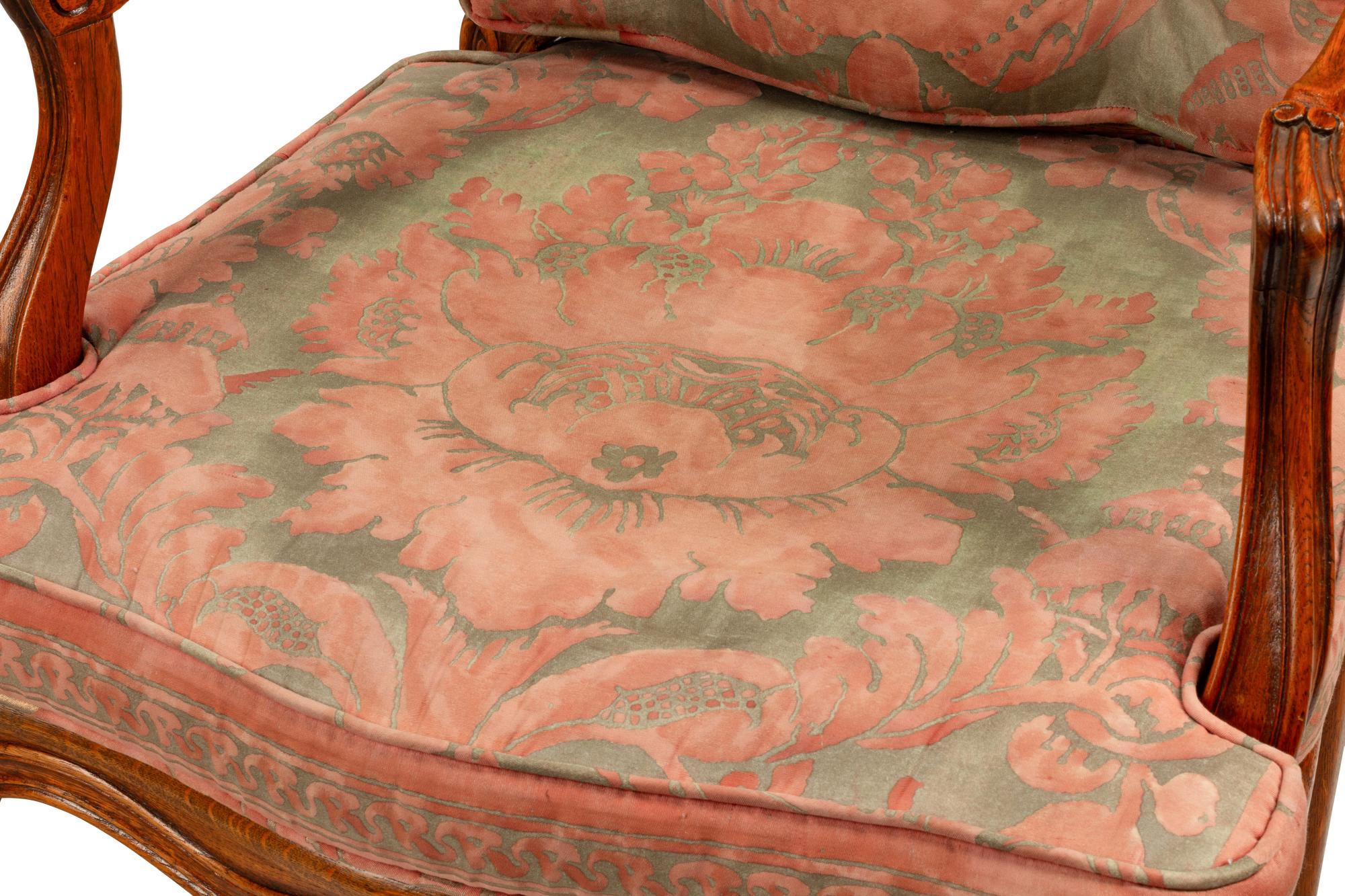 A Pair of Louis XV Style Oak Fauteuils