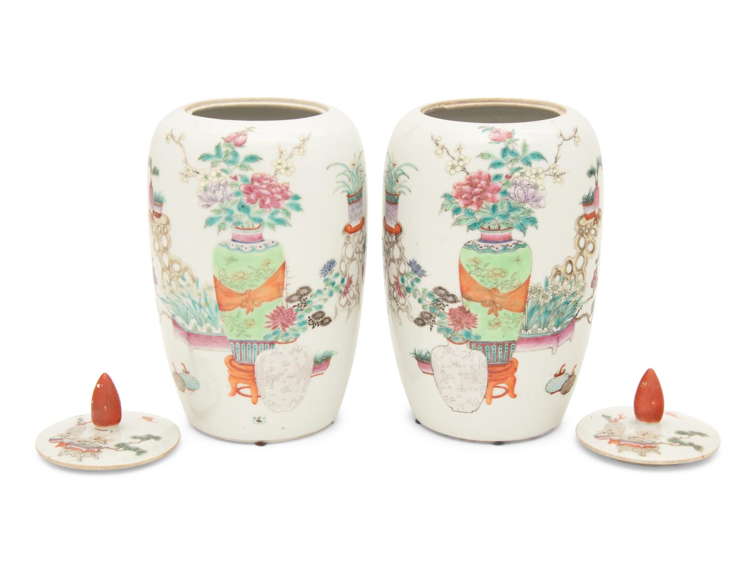 A Pair of Famille Rose Porcelain Ovoid Jars and Covers