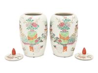 A Pair of Famille Rose Porcelain Ovoid Jars and Covers