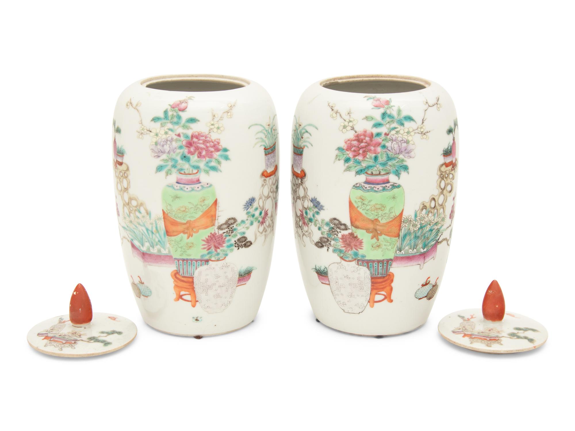 A Pair of Famille Rose Porcelain Ovoid Jars and Covers