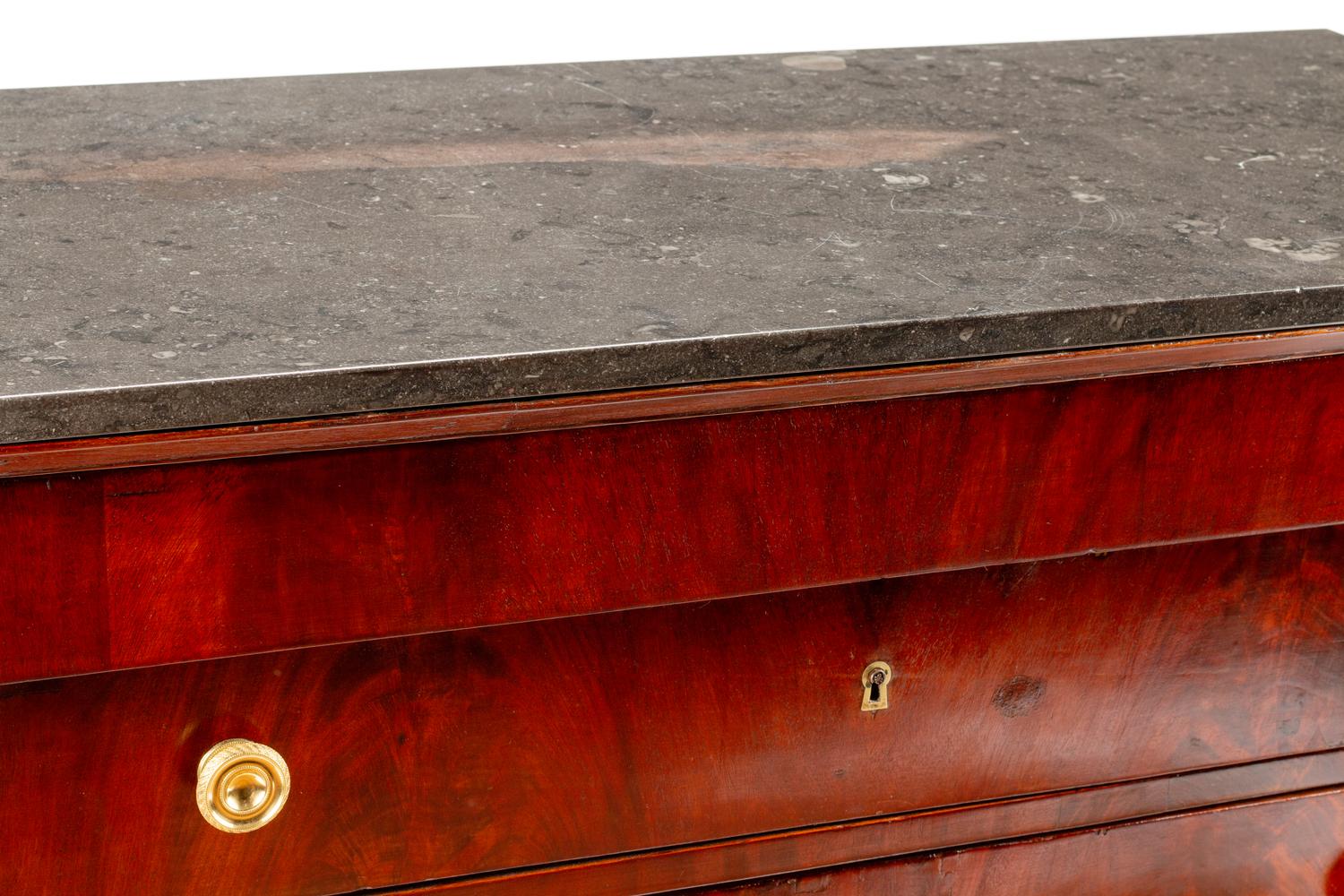 An Empire Style Gilt Bronze Mounted Mahogany Marble-Top Commode