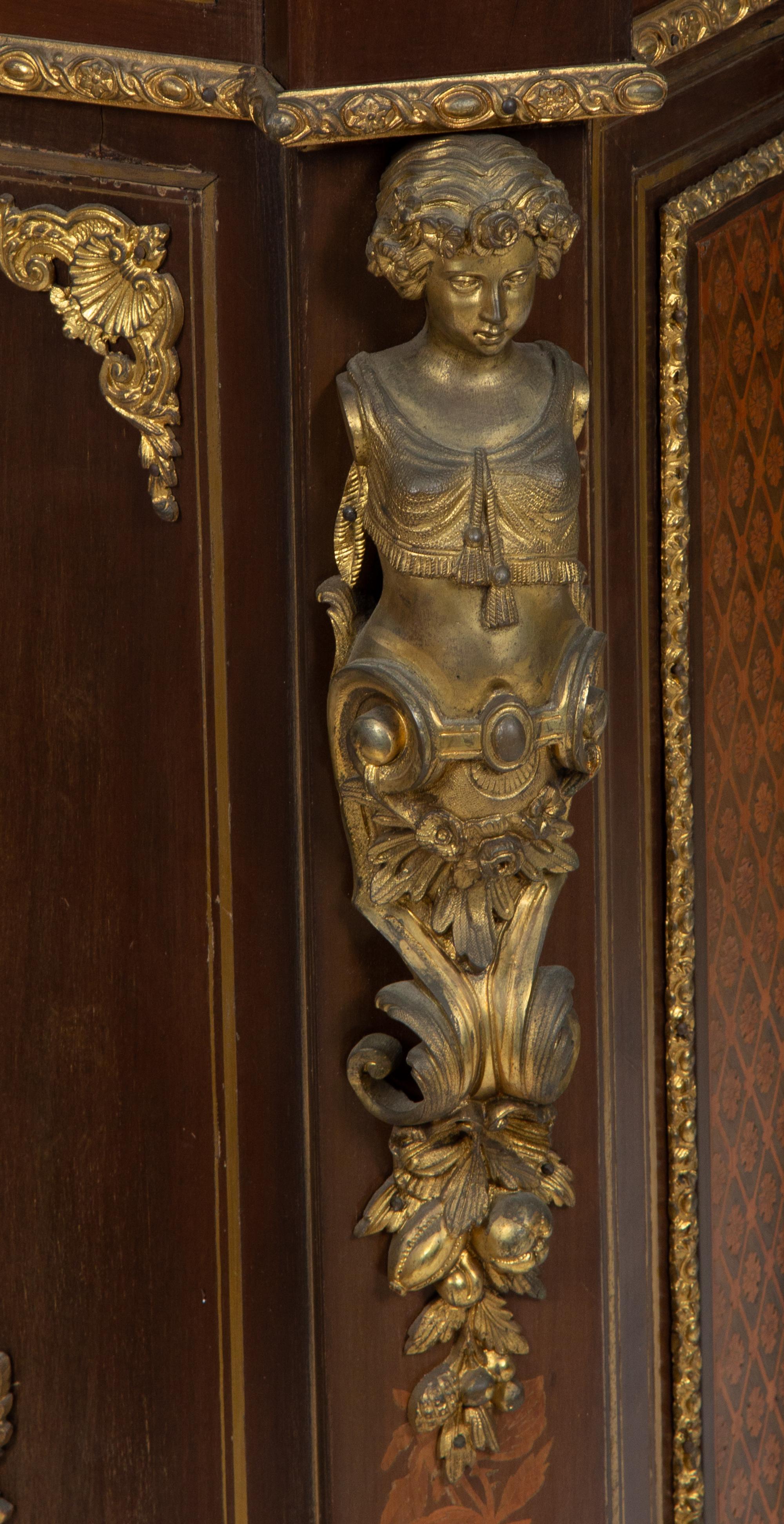 A Napoleon III Style Gilt Bronze Mounted Marquetry Marble-Top Side Cabinet