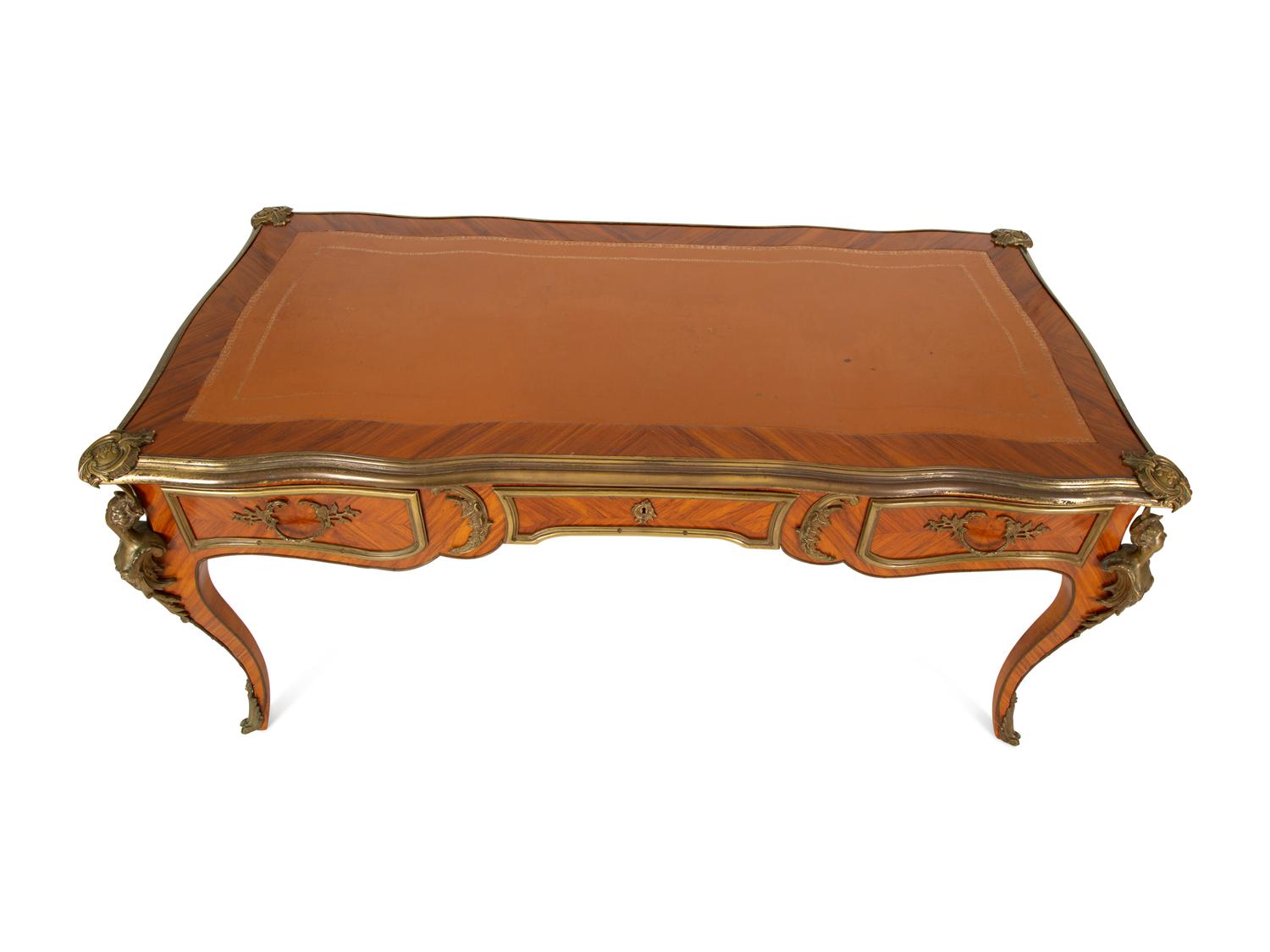A Louis XV Style Gilt Bronze Mounted Tulipwood Bureau Plat