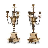 A Pair of French Gilt Metal and Alabaster Candelabra