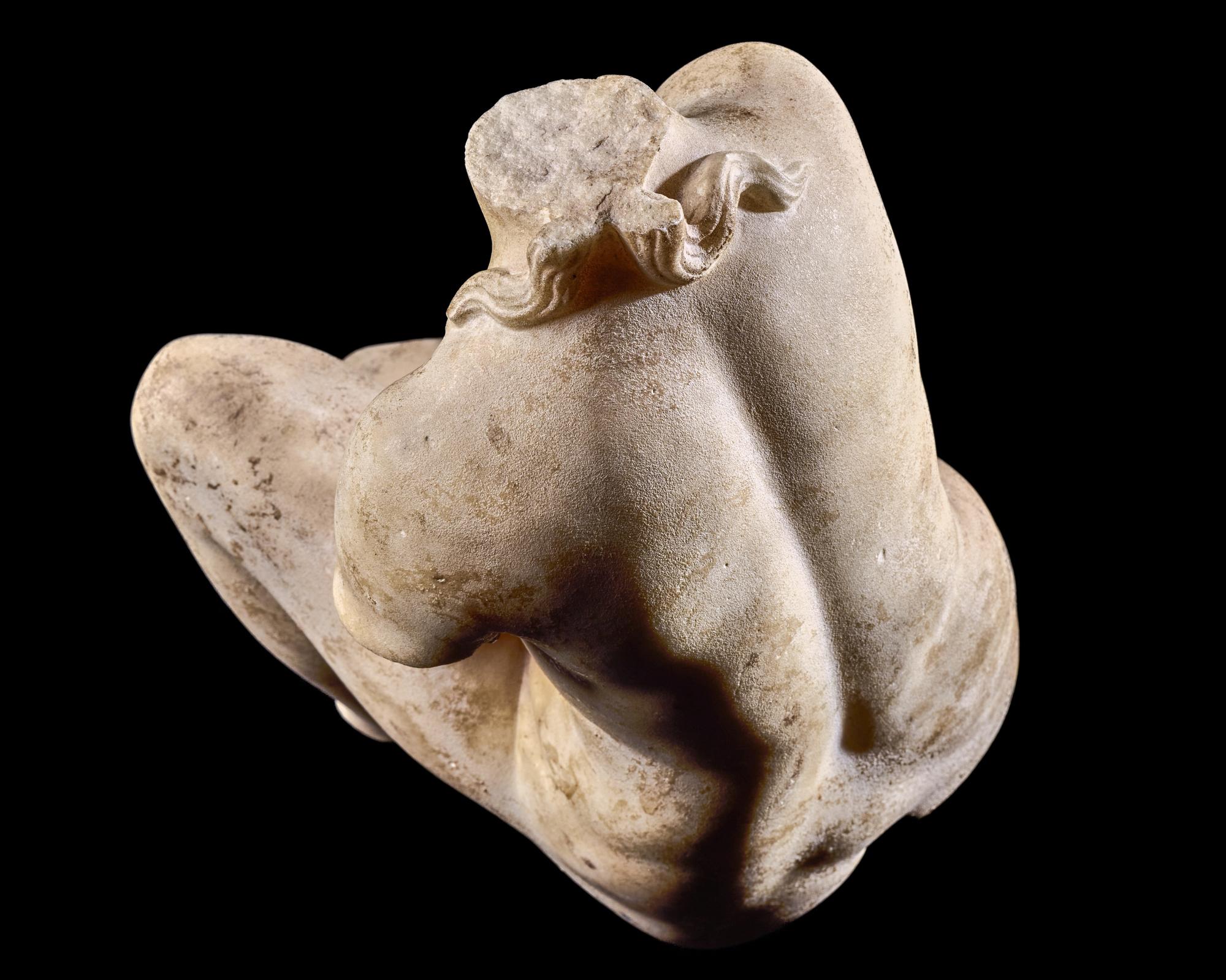 A Roman Marble Crouching Venus
