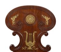 A Pair of French Empire Style Gilt Metal Mounted Mahogany Hall Chairs