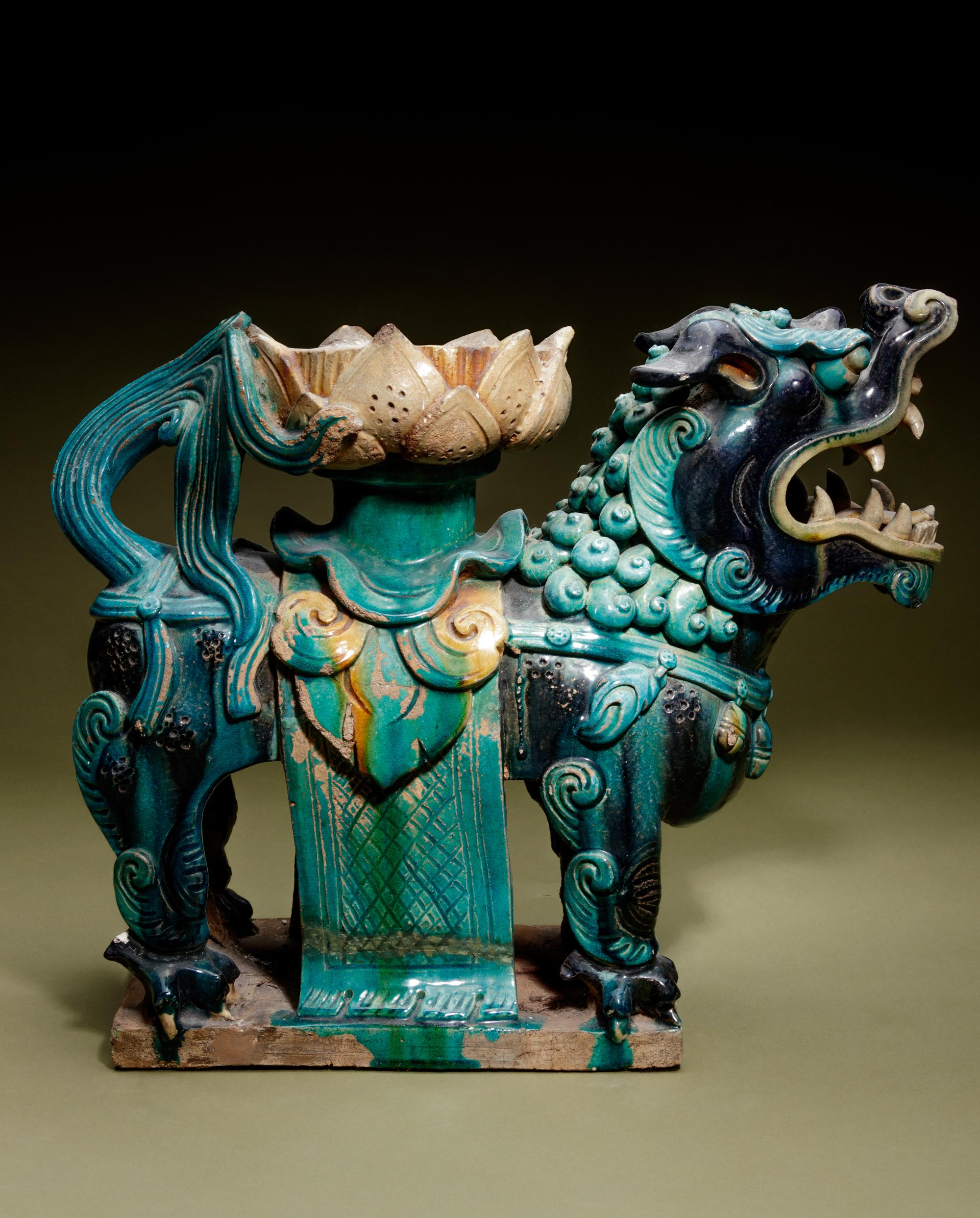 A Turquoise, Blue and Yellow Glazed Tilewoks 'Lion' Stand