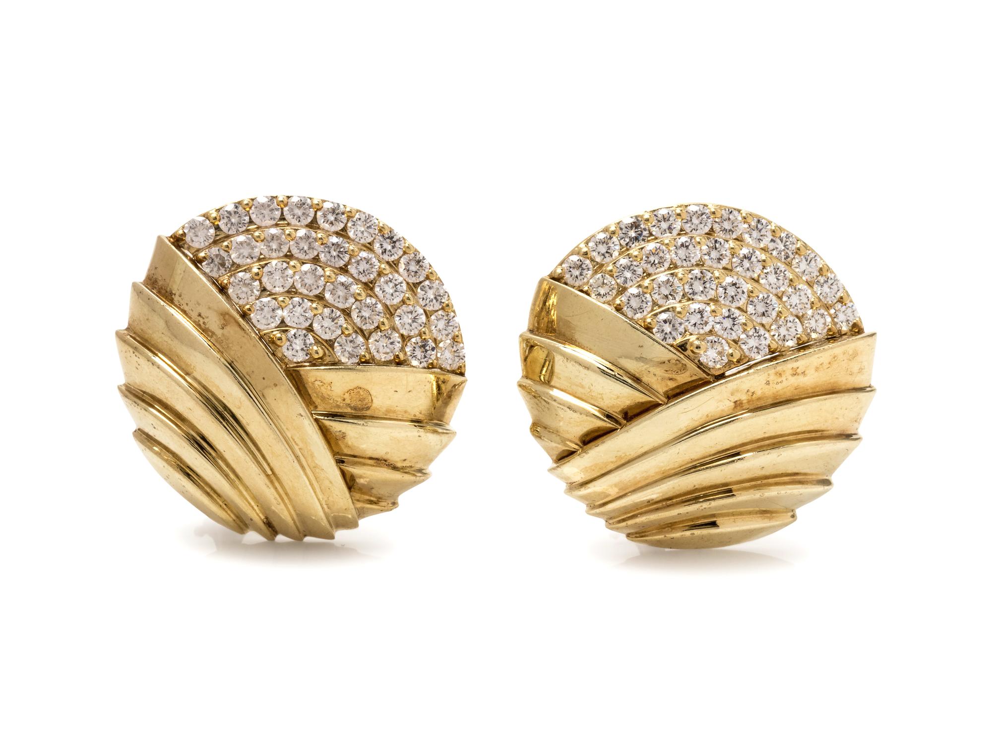 A Pair of 14 Karat Yellow Gold and Diamond Earclips,