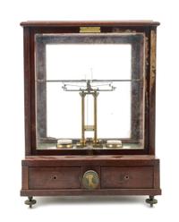 An English Brass and Wood Cased Assayer's Balance Height of case 19 1/2 x width 14 3/4 x depth 10 1/2 inches. — L. OERTLING, LONDON, LATE 19TH CENTURY