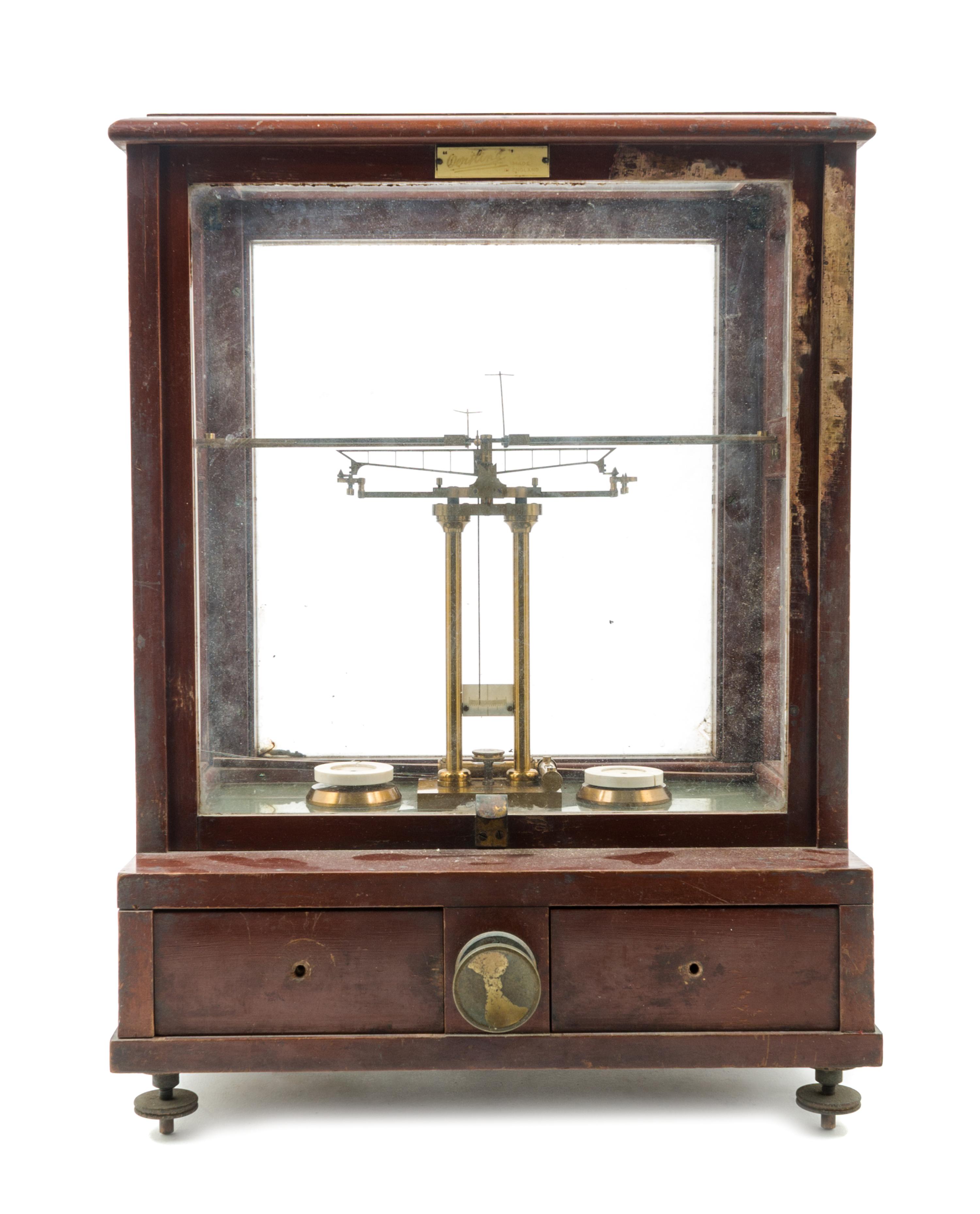 An English Brass and Wood Cased Assayer's Balance Height of case 19 1/2 x width 14 3/4 x depth 10 1/2 inches. — L. OERTLING, LONDON, LATE 19TH CENTURY