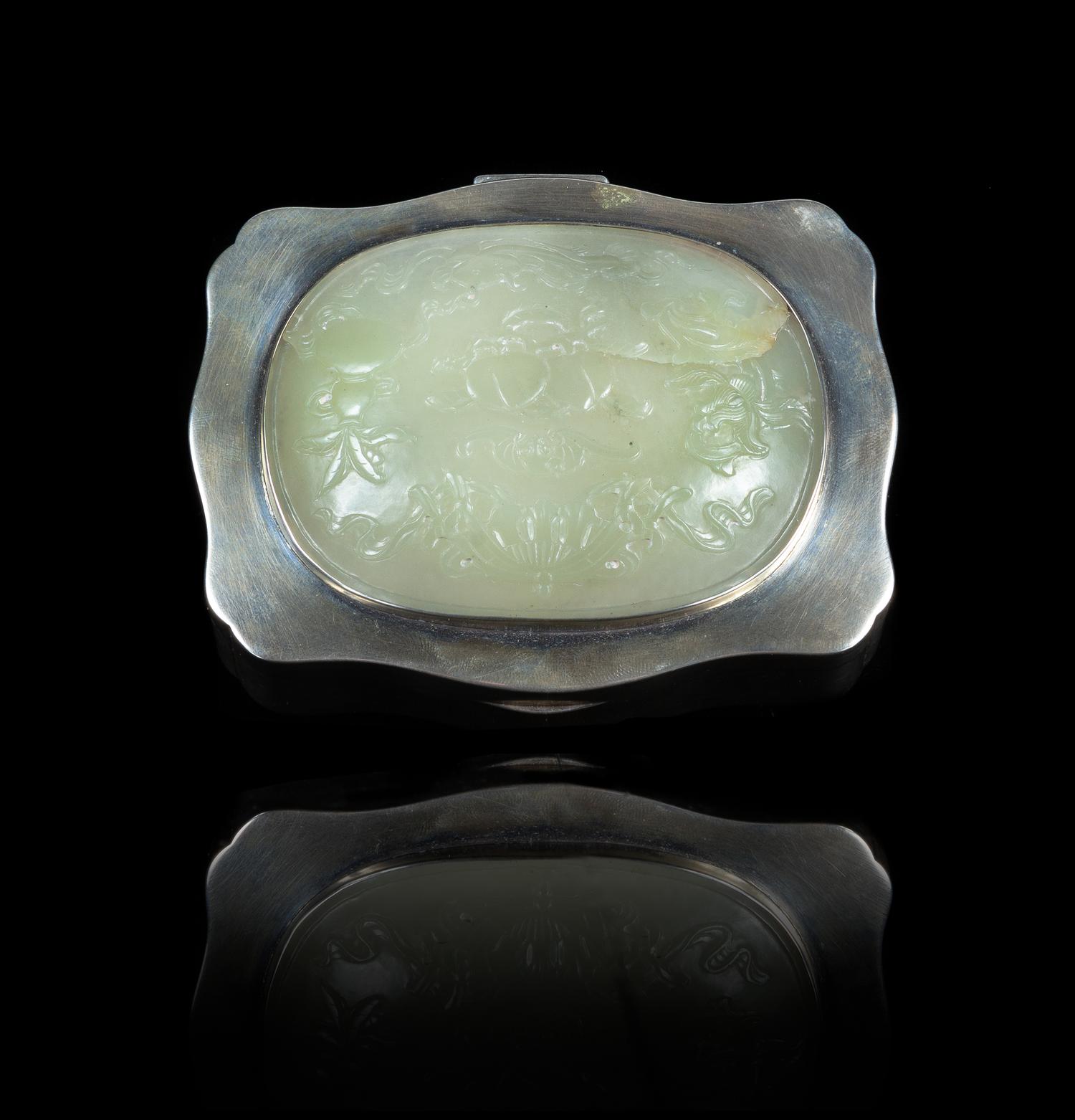 A White Jade Inset Silver Hinged Box Width of jade 3 1/2 x depth 2 5/8 inches; width of box 4 3/8 inches. — JADE: 18TH/19TH CENTURYBOX: DUTCH, 1945-1946