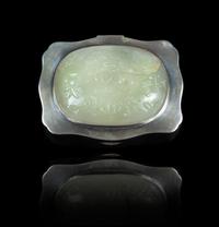 A White Jade Inset Silver Hinged Box Width of jade 3 1/2 x depth 2 5/8 inches; width of box 4 3/8 inches. — JADE: 18TH/19TH CENTURYBOX: DUTCH, 1945-1946
