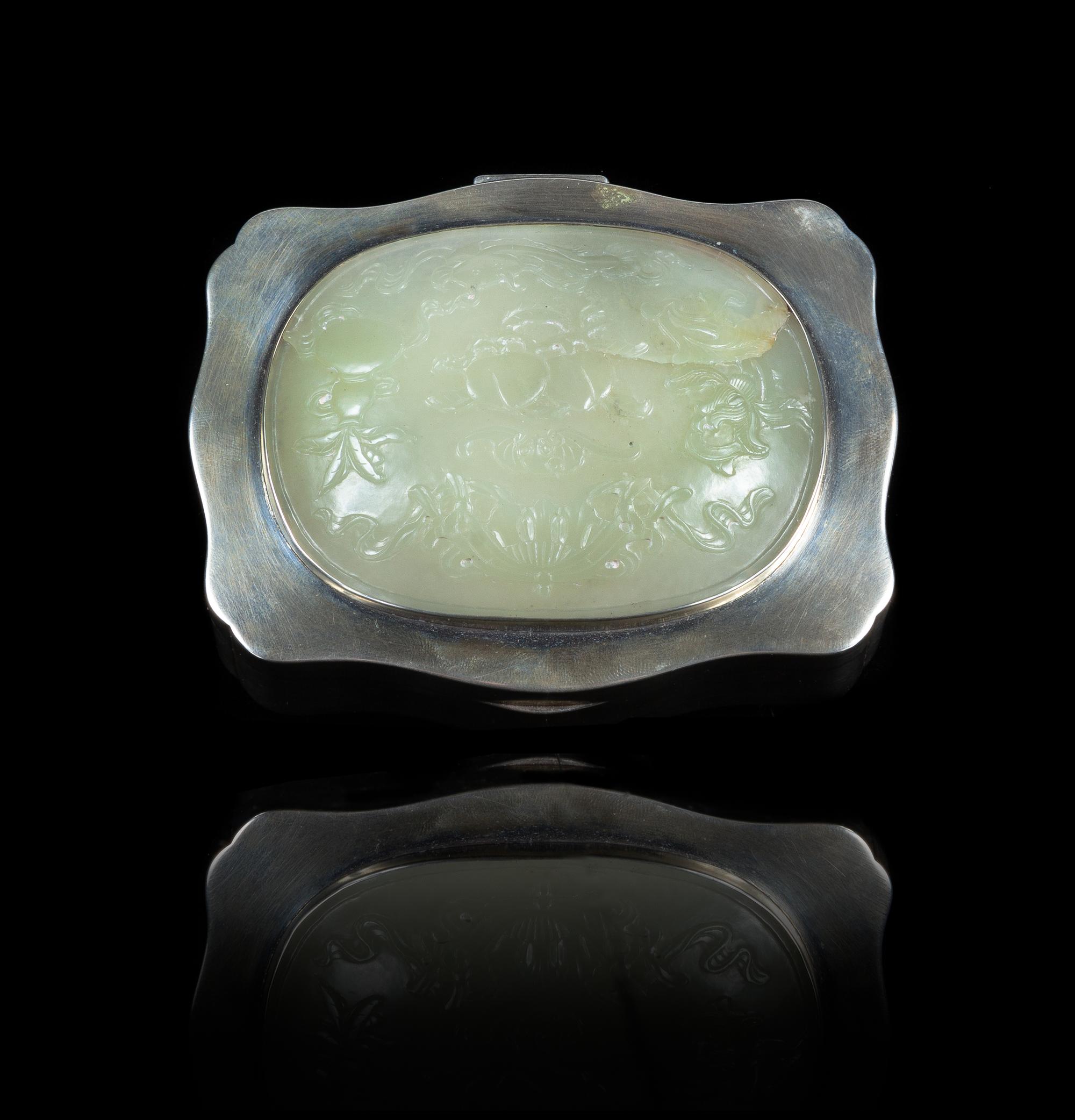 A White Jade Inset Silver Hinged Box Width of jade 3 1/2 x depth 2 5/8 inches; width of box 4 3/8 inches. — JADE: 18TH/19TH CENTURYBOX: DUTCH, 1945-1946