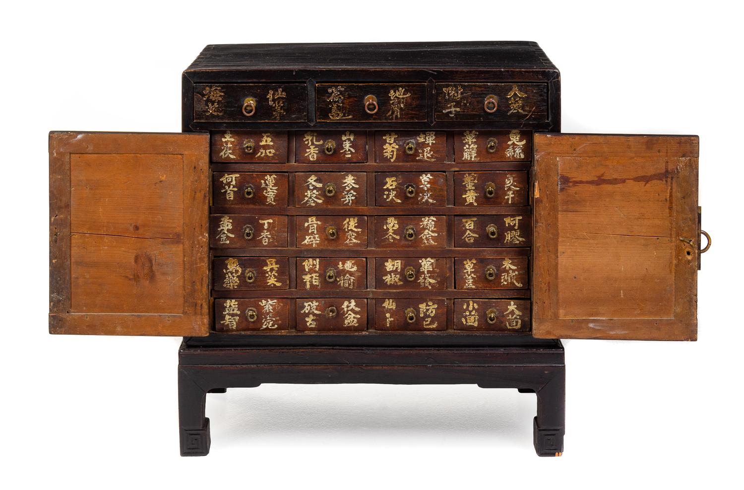 A Chinese Lacquered Apothecary Cabinet Height 21 3/4 x width 21 x depth 10 1/2 inches. — LATE 19TH CENTURY