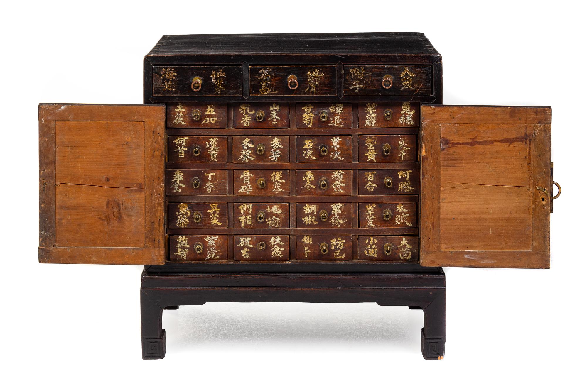 A Chinese Lacquered Apothecary Cabinet Height 21 3/4 x width 21 x depth 10 1/2 inches. — LATE 19TH CENTURY
