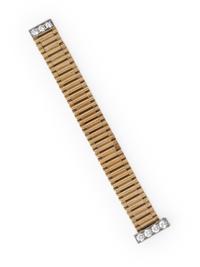 YELLOW GOLD AND DIAMOND ADJUSTABLE BUCKLE RING