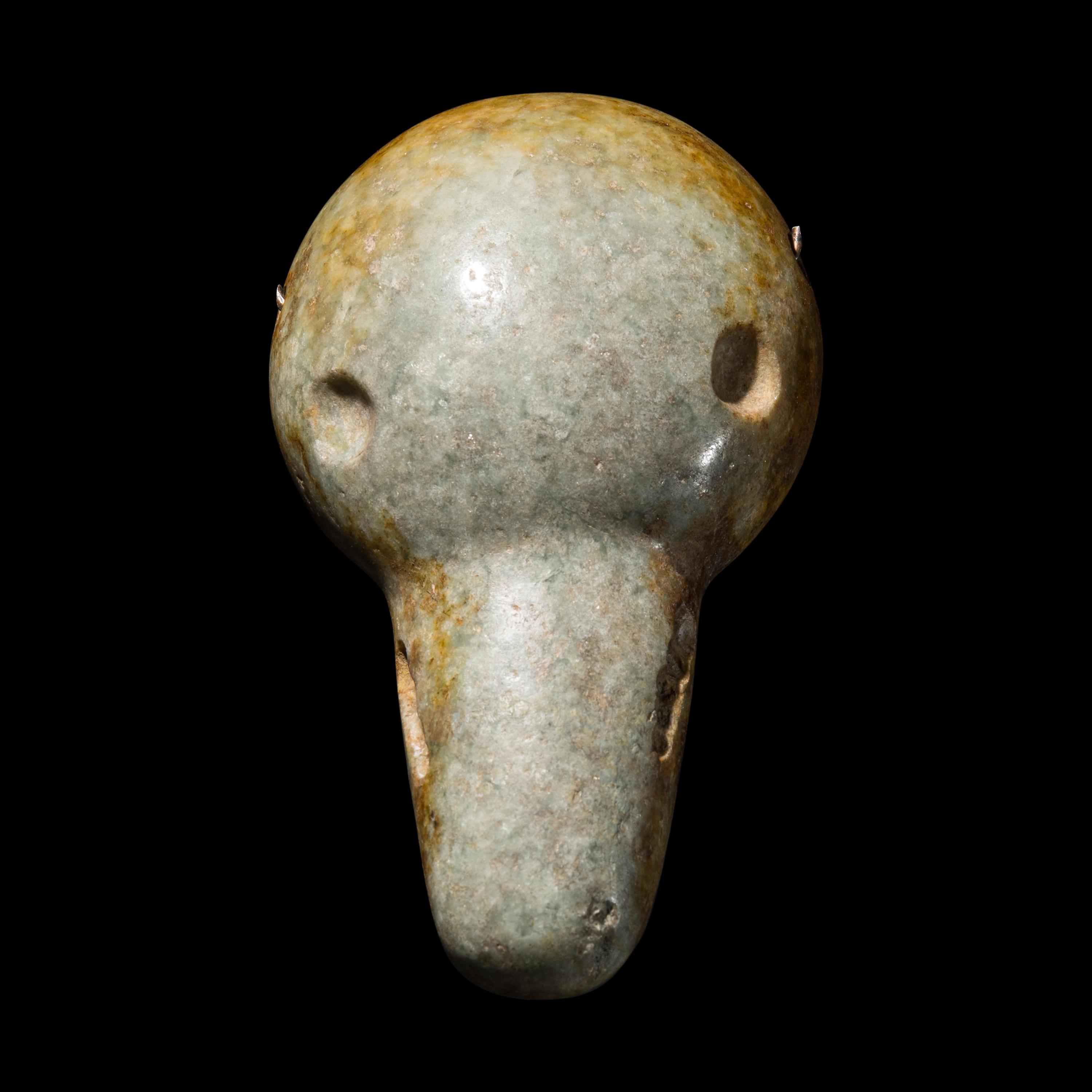 An Olmec Jade Pendant
