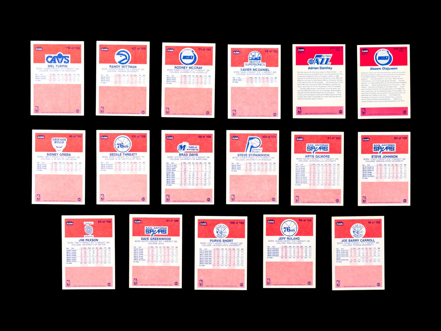 A Group of 71 1986 Fleer Basketball Cards and Stickers (Including Julius Erving, Patrick Ewing, Magic Johnson and Hakeem Olajuwon)