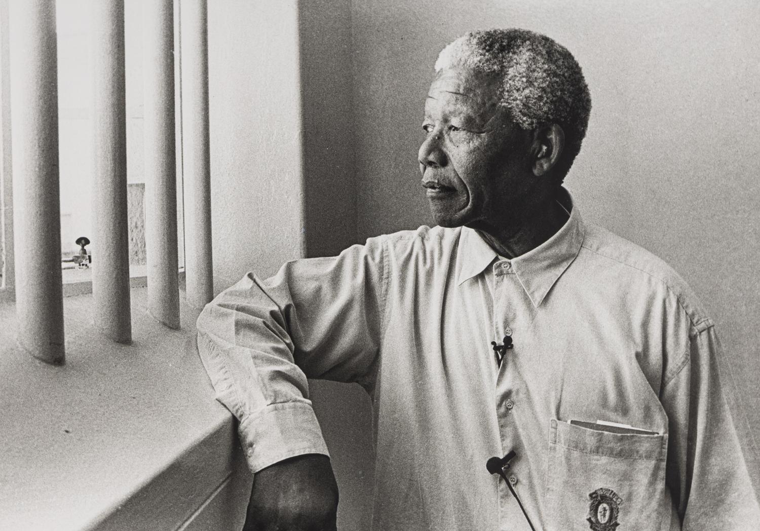 Jürgen Schadeberg (1931-2020) Nelson Mandela revisiting his cell on Robben Island, 1994