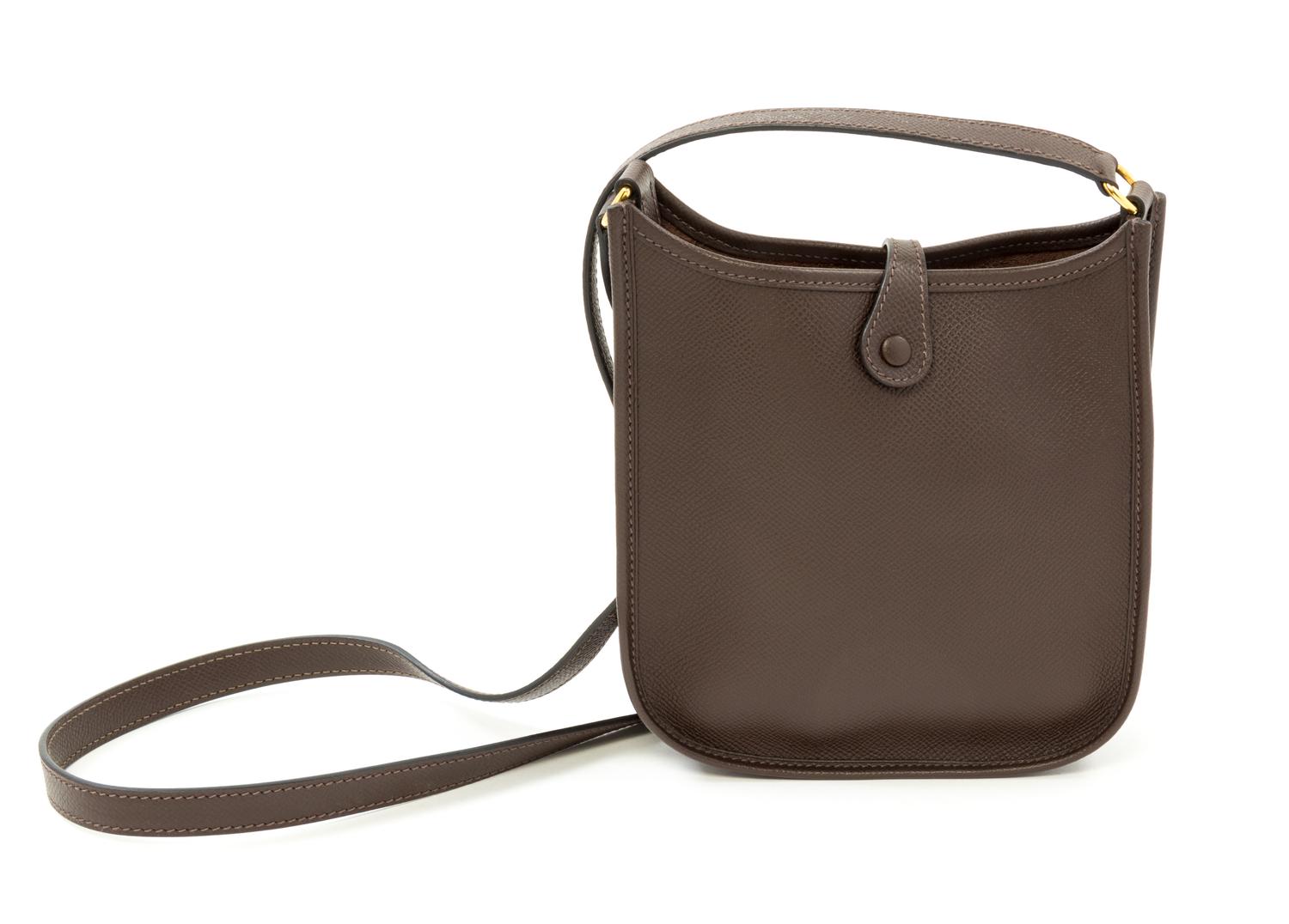 An Hermès Dark Marron Epsom Evelyne TPM, 6.7" x 7" x 2"; Strap drop: 22".