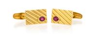 A Pair of 18 Karat Yellow Gold and Ruby Cufflinks, 9.10 dwts.