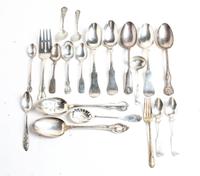 A Group of American Silver Flatware Articles, various makers, comprising serving spoons, serving forks, pierced serving spoons, sauce l