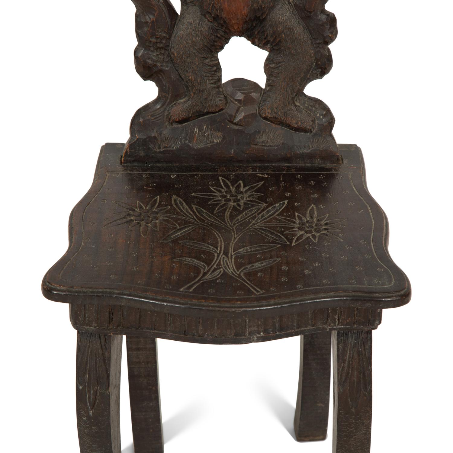 A Black Forest Carved Wood Child's Chair