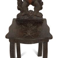 A Black Forest Carved Wood Child's Chair