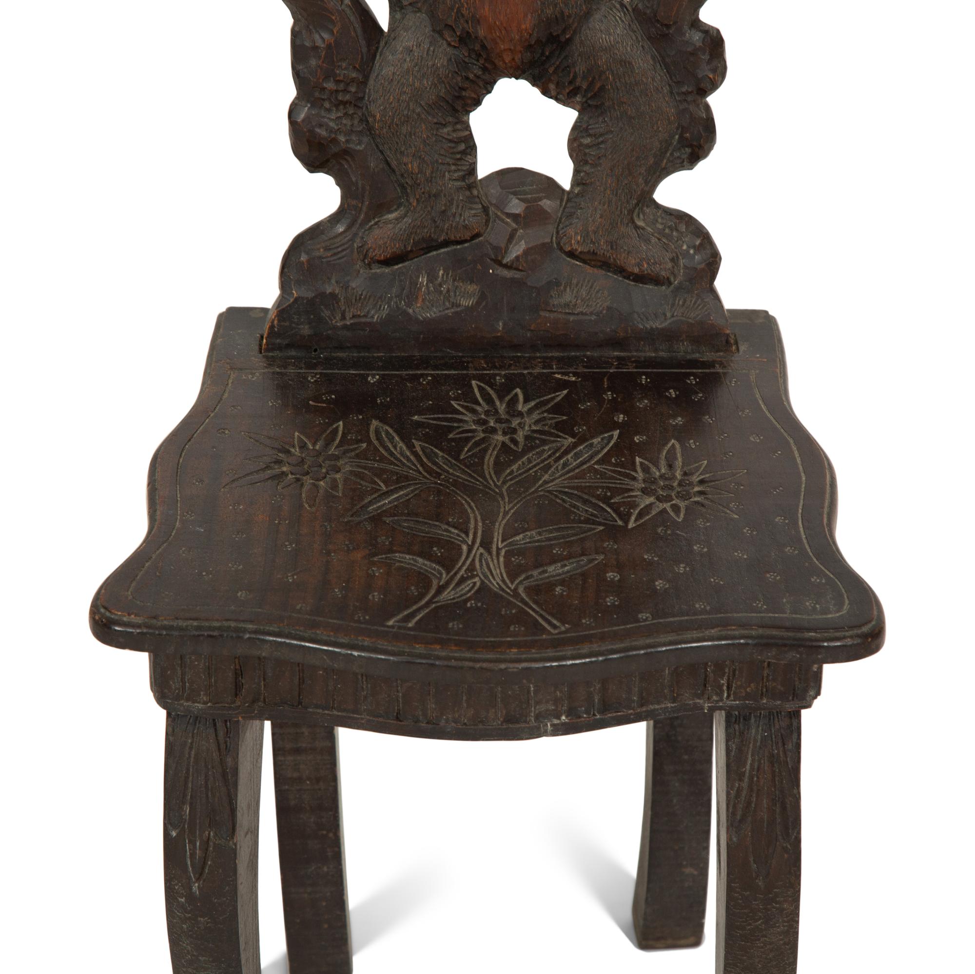 A Black Forest Carved Wood Child's Chair