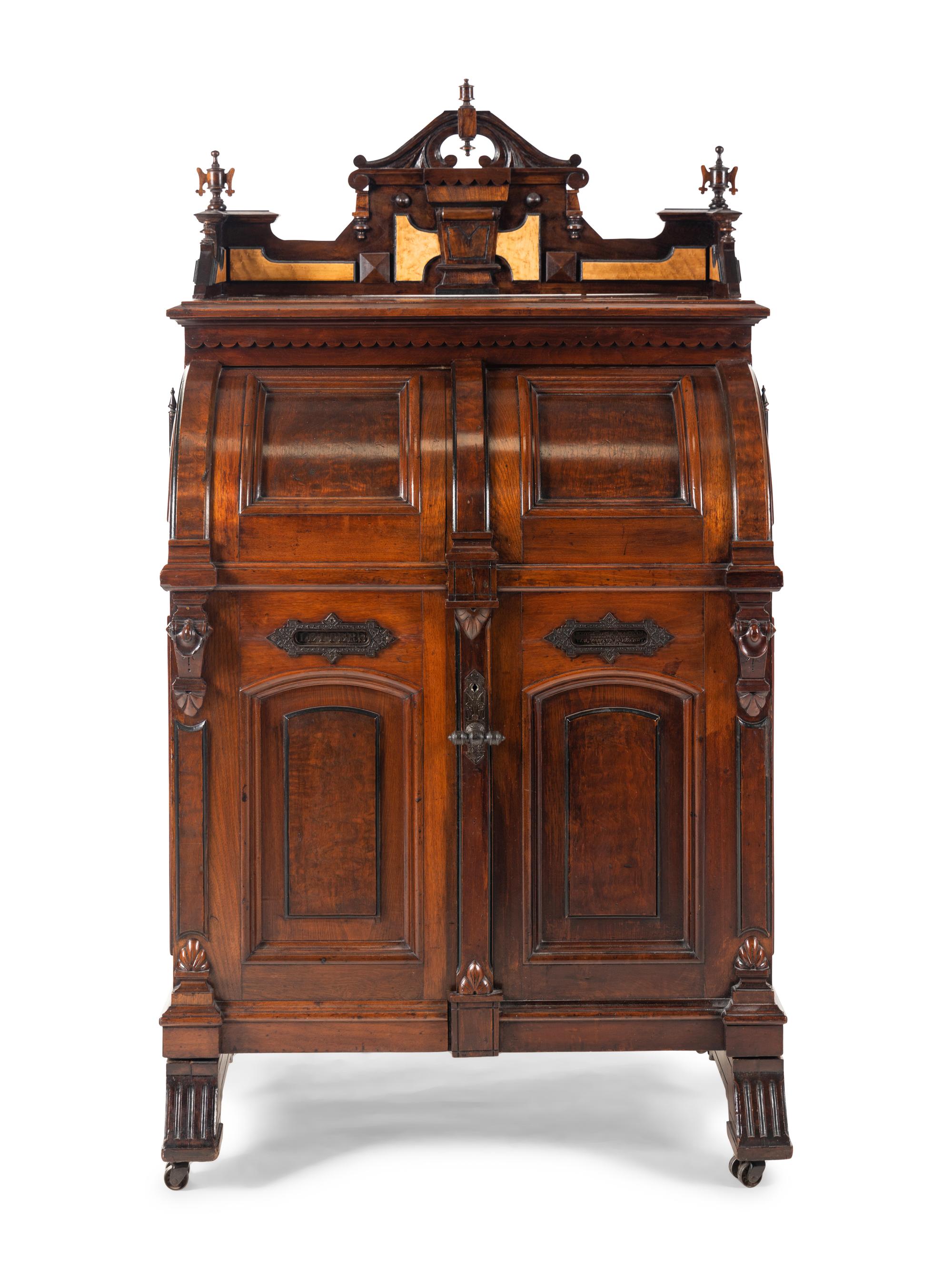 A Victorian Walnut and Bird’s Eye Maple Wooten Patent Desk