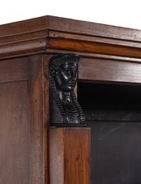A Pair of Italian Parcel Ebonized Walnut Bookcases