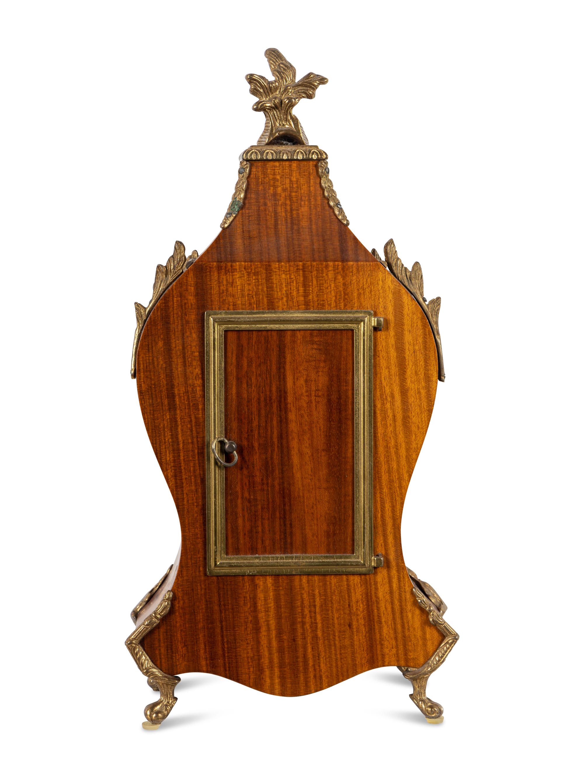 A Napoleon III Style Gilt Metal Mounted Marquetry Bracket Clock
