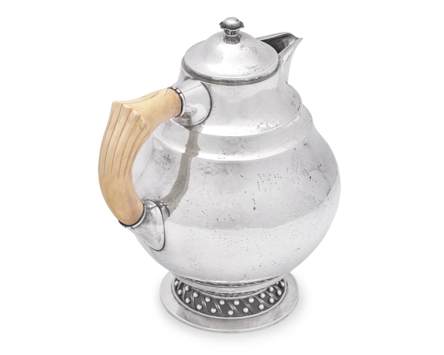A Johan Rohde Designed Georg Jensen Silver Covered Pitcher
