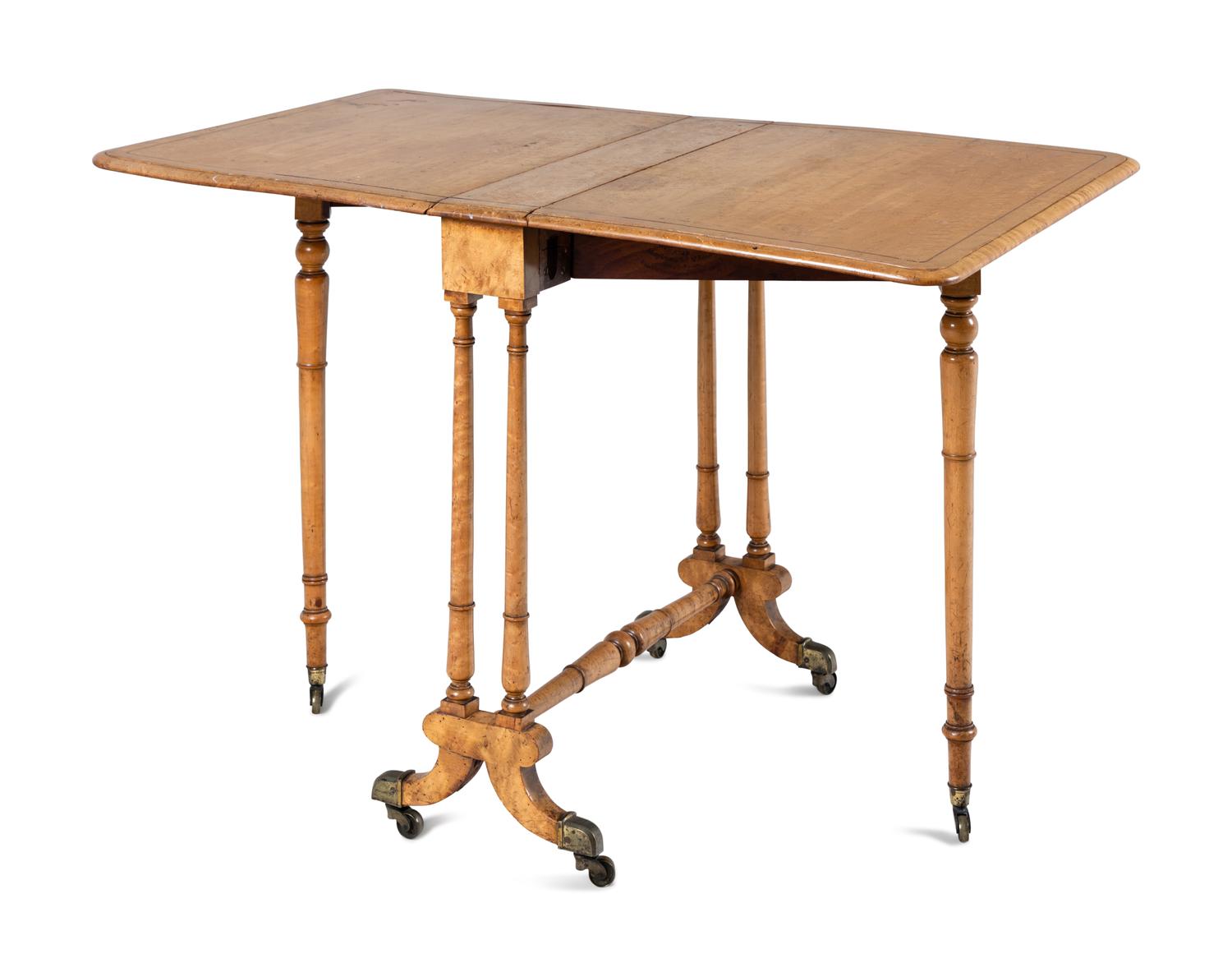 A Victorian Bird's Eye Maple Sutherland Table