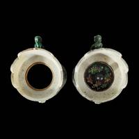 An associated pair of Chinese famille noir-decorated porcelain ceremonial ewers 黑地瓷胎画珐琅多穆壶两只 或为一对 Qing dynasty ?