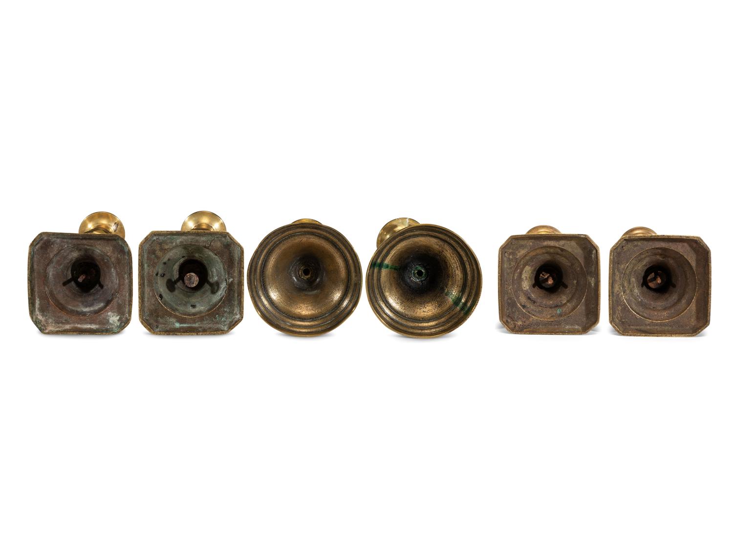 Three Pairs of English Brass Candlesticks