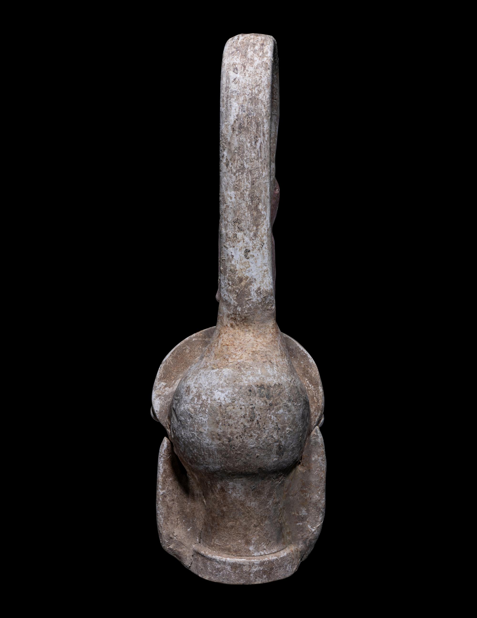 A Canosan Pottery Figural Oinochoe