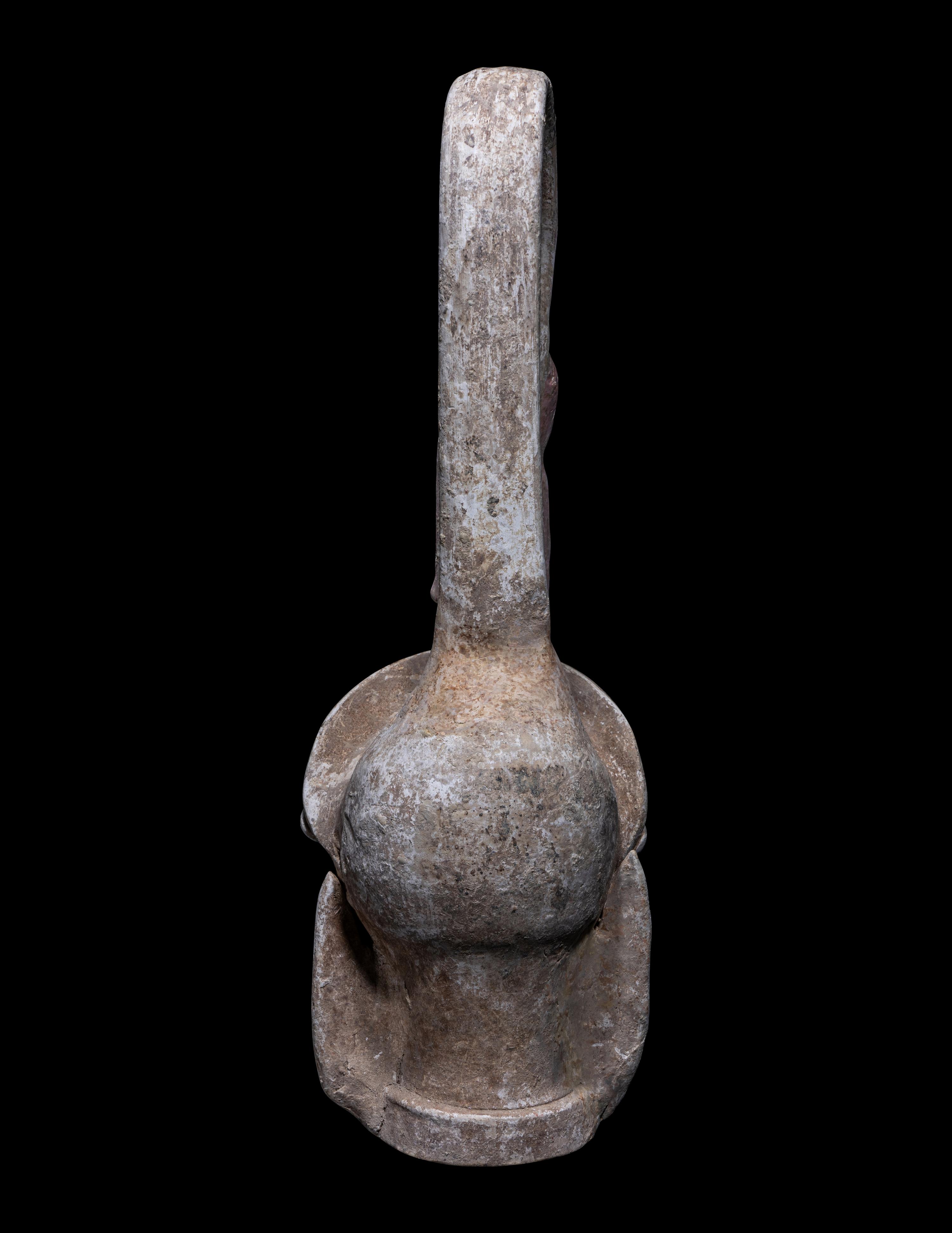 A Canosan Pottery Figural Oinochoe