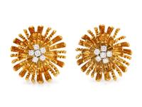 A Pair of 18 Karat Yellow Gold and Diamond Earclips,