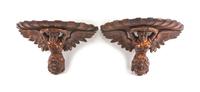 A Pair of Continental Carved Figural Brackets Height 16 x width 26 x depth 11 inches. — 19TH CENTURY