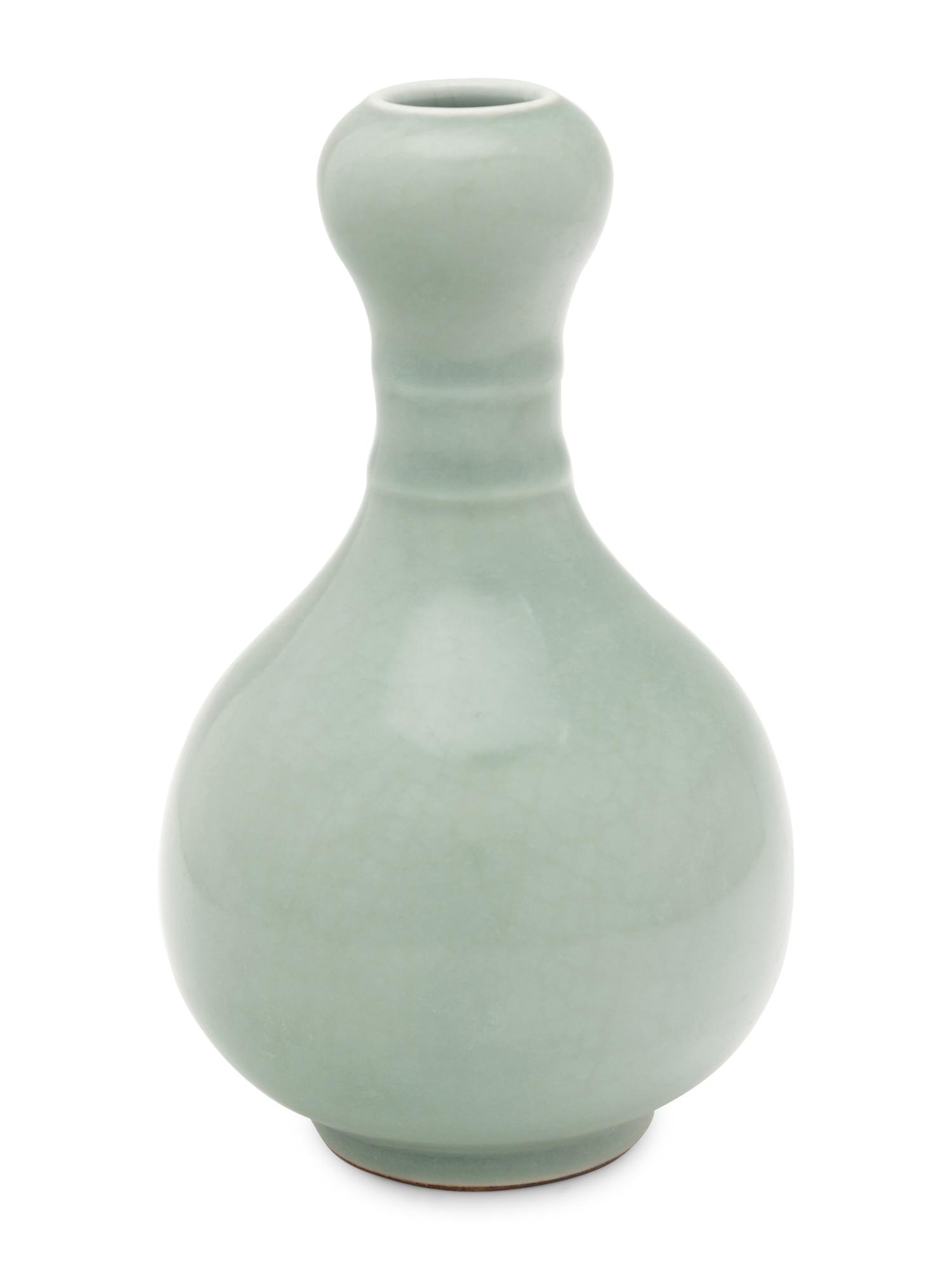 A Celadon Glazed Porcelain Garlic-Mouth Bottle Vase