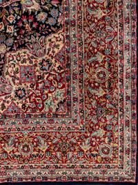A Kirman Wool Rug