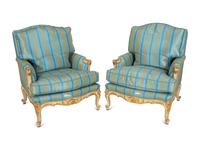 A Pair of Louis XV Style Painted and Parcel Gilt Bergeres