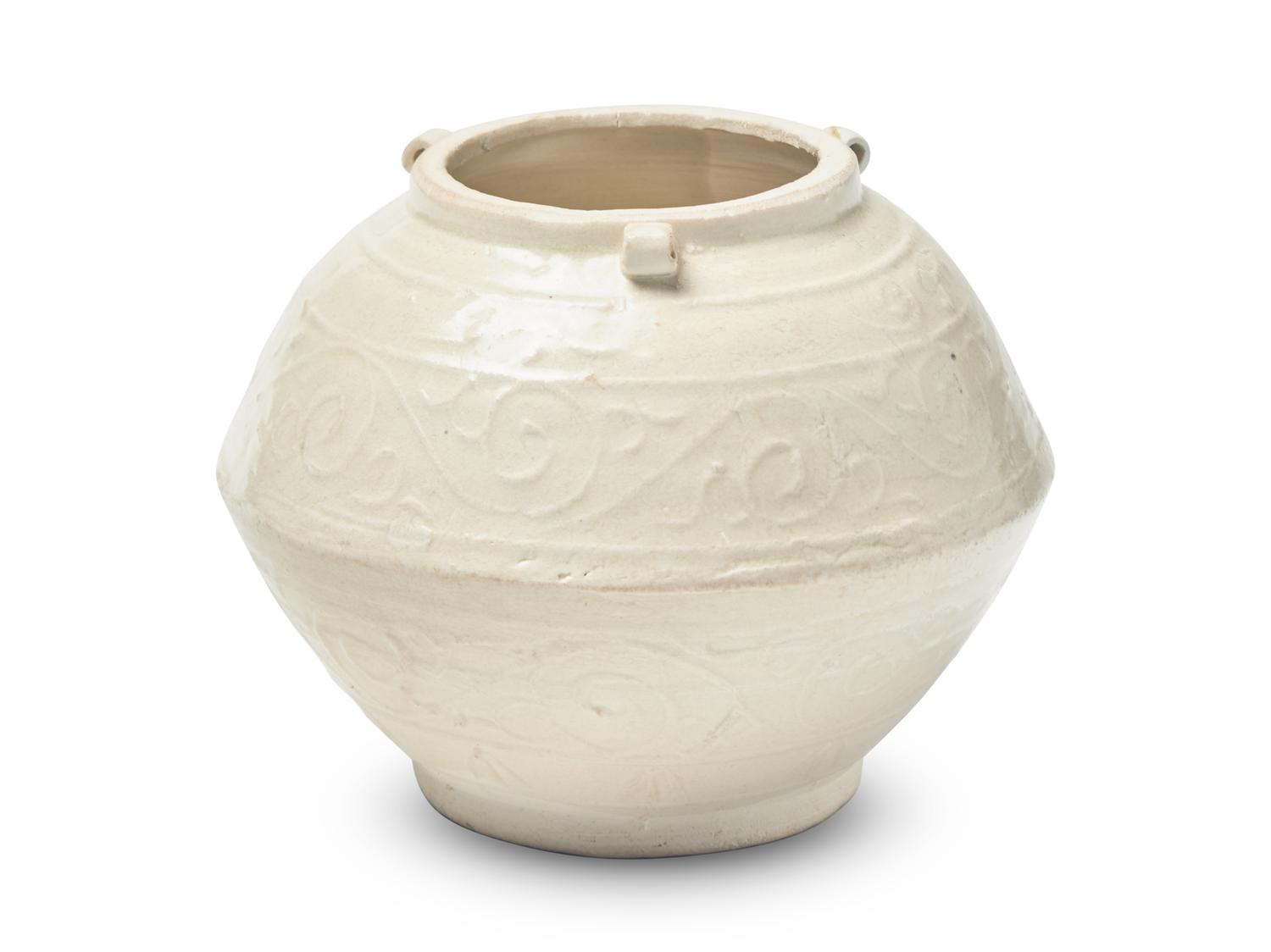 A Chinese White Glazed Molded Whiteware Jar, Possibly Fujian, Yuan to Ming Dynasty 或爲元-明 白釉模印卷草紋三系罐