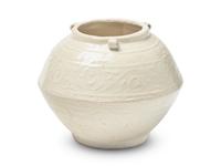 A Chinese White Glazed Molded Whiteware Jar, Possibly Fujian, Yuan to Ming Dynasty 或爲元-明 白釉模印卷草紋三系罐