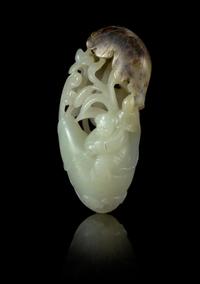 A Carved Celadon Jade Toggle Length 3 1/2 inches.